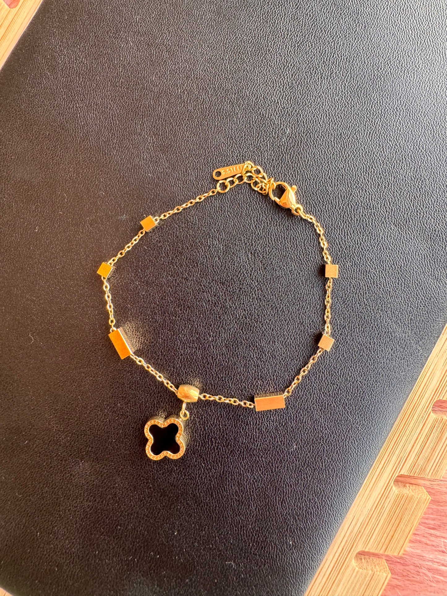 Dual-Tone Clover Charm Bracelet (Black and White)