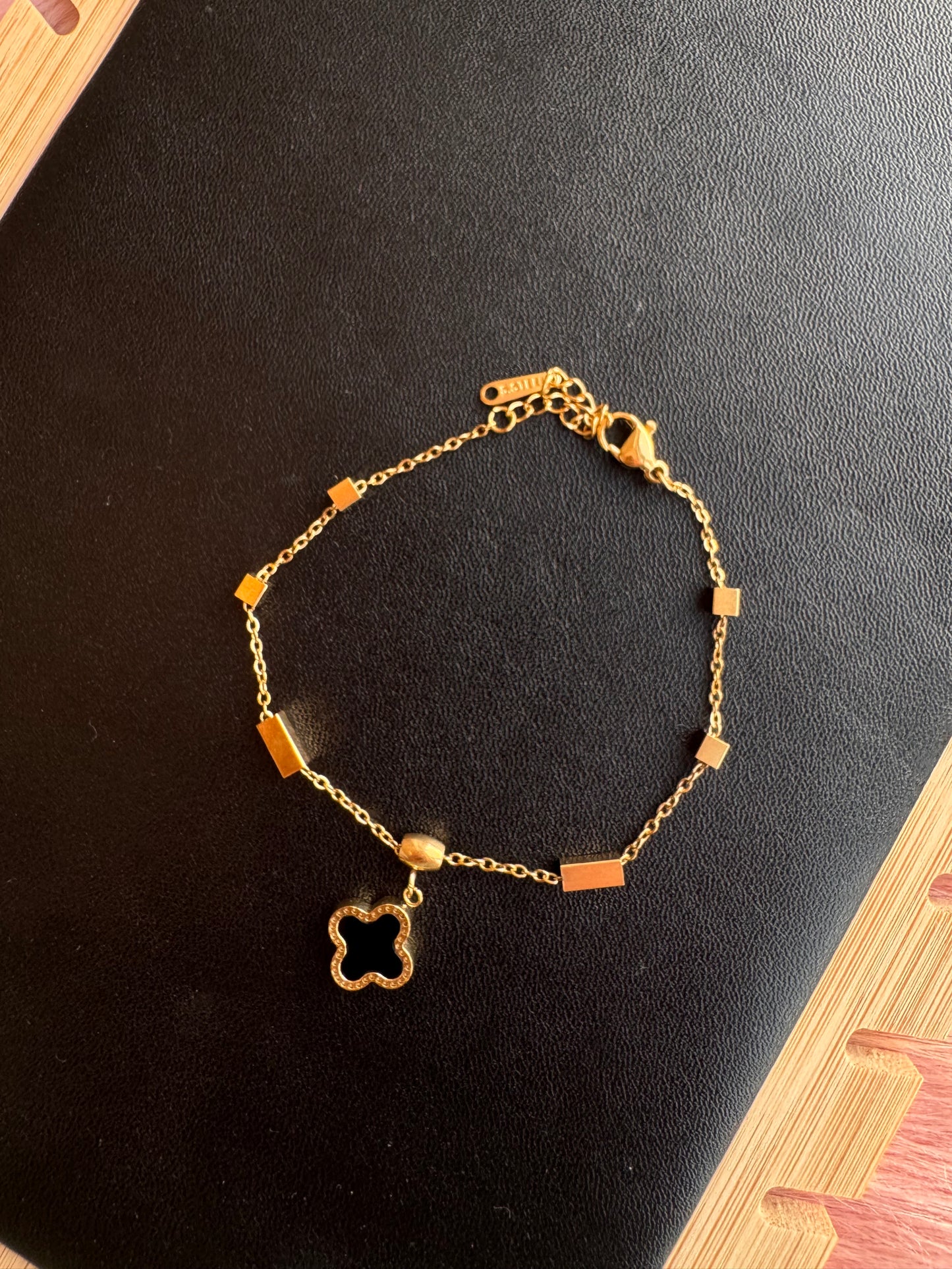 Dual-Tone Clover Charm Bracelet (Black and White)