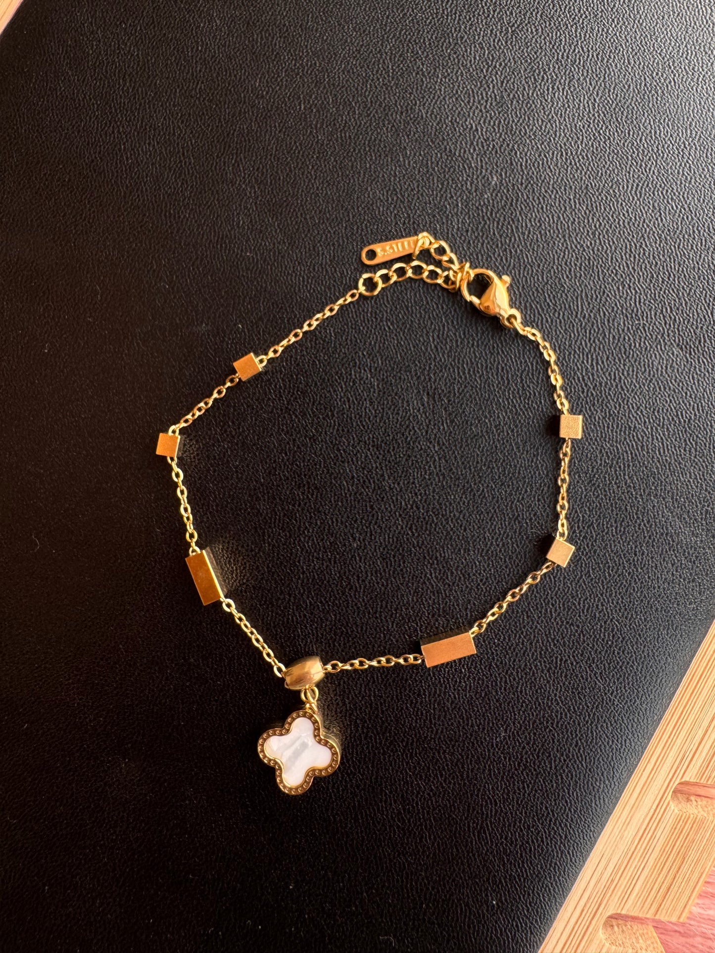Dual-Tone Clover Charm Bracelet (Black and White)