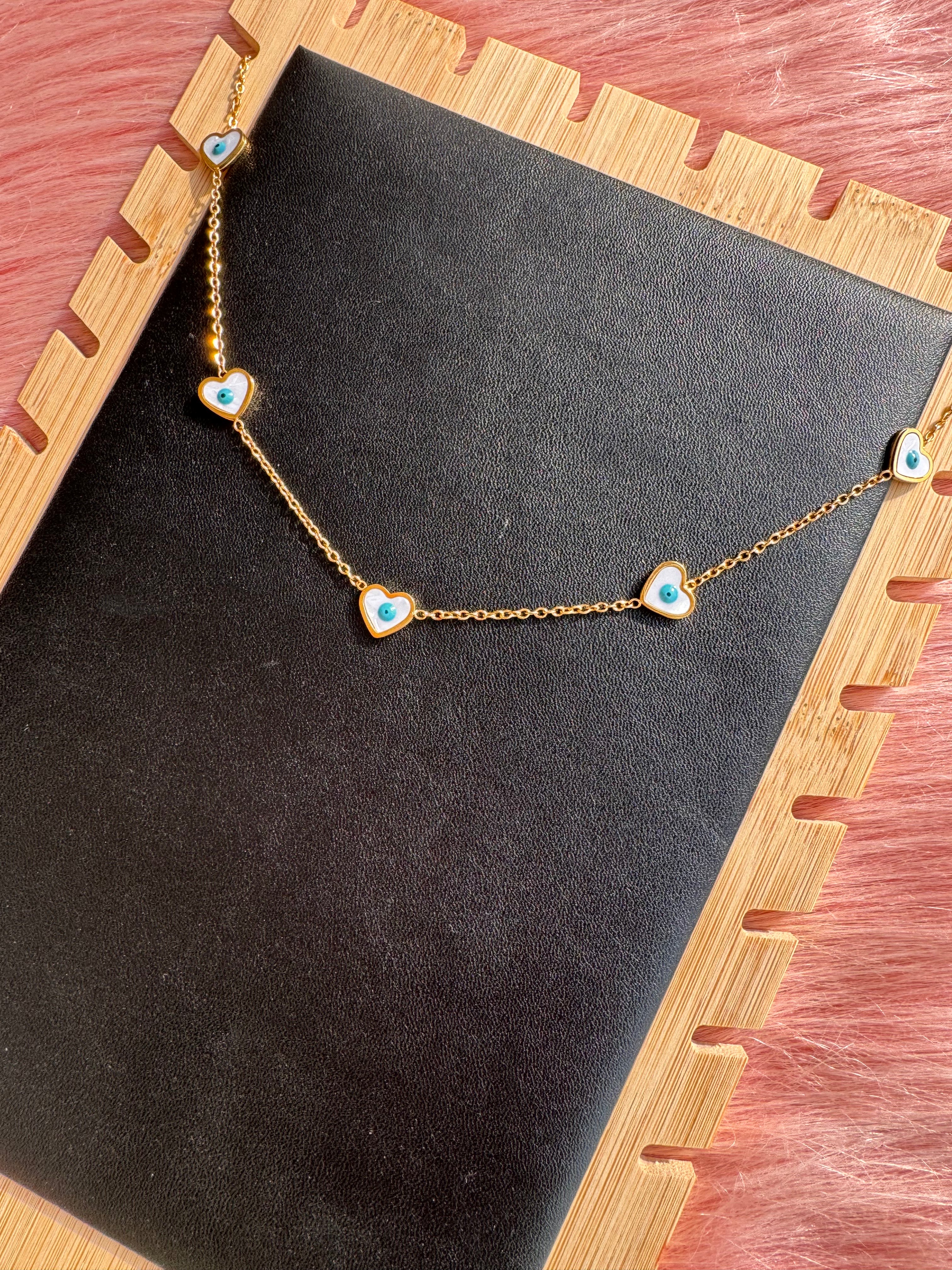 The Pearl-Lustre Evil Eye Heart Station Necklace