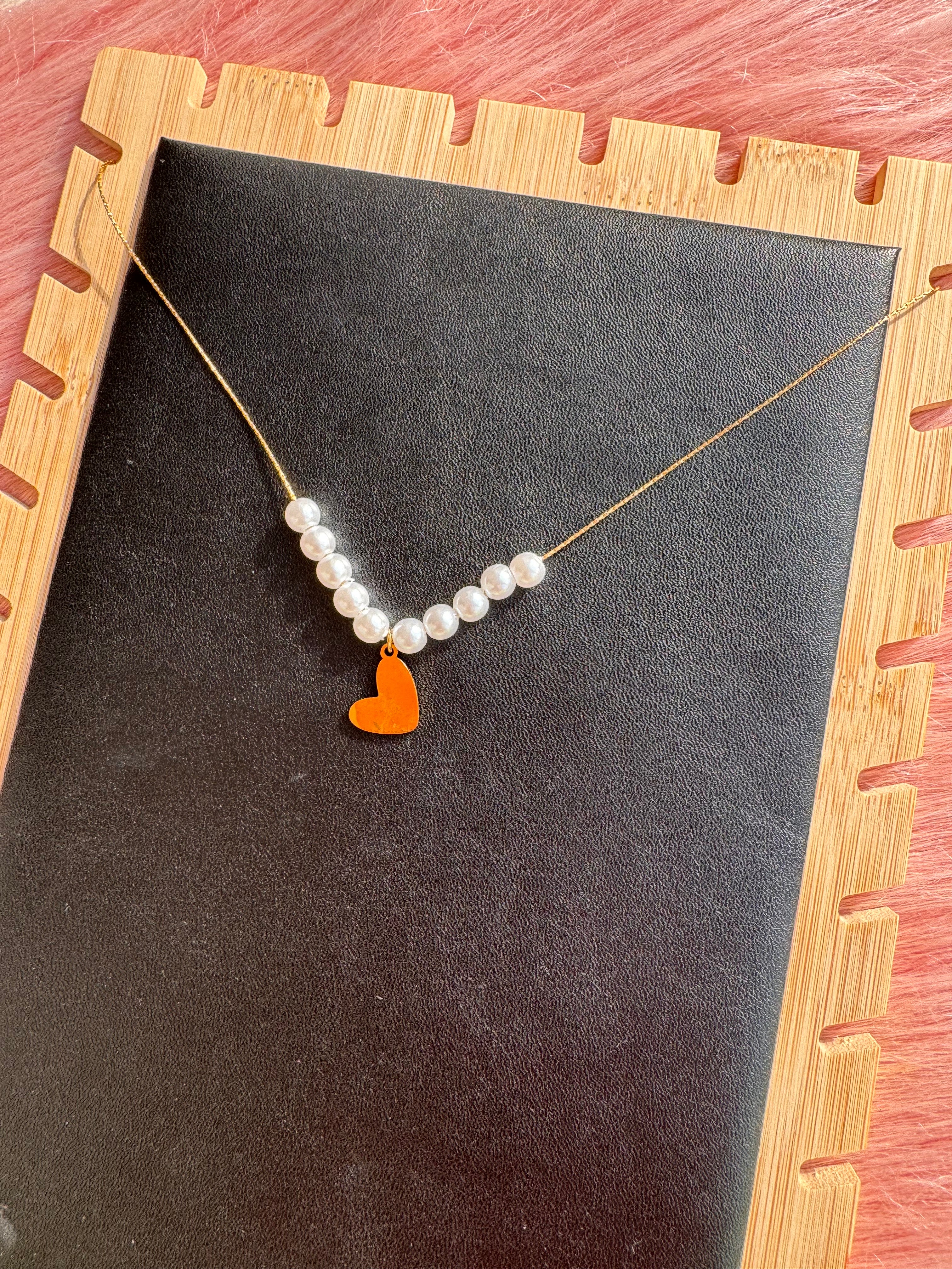 The Asymmetric Pearl Heart Necklace