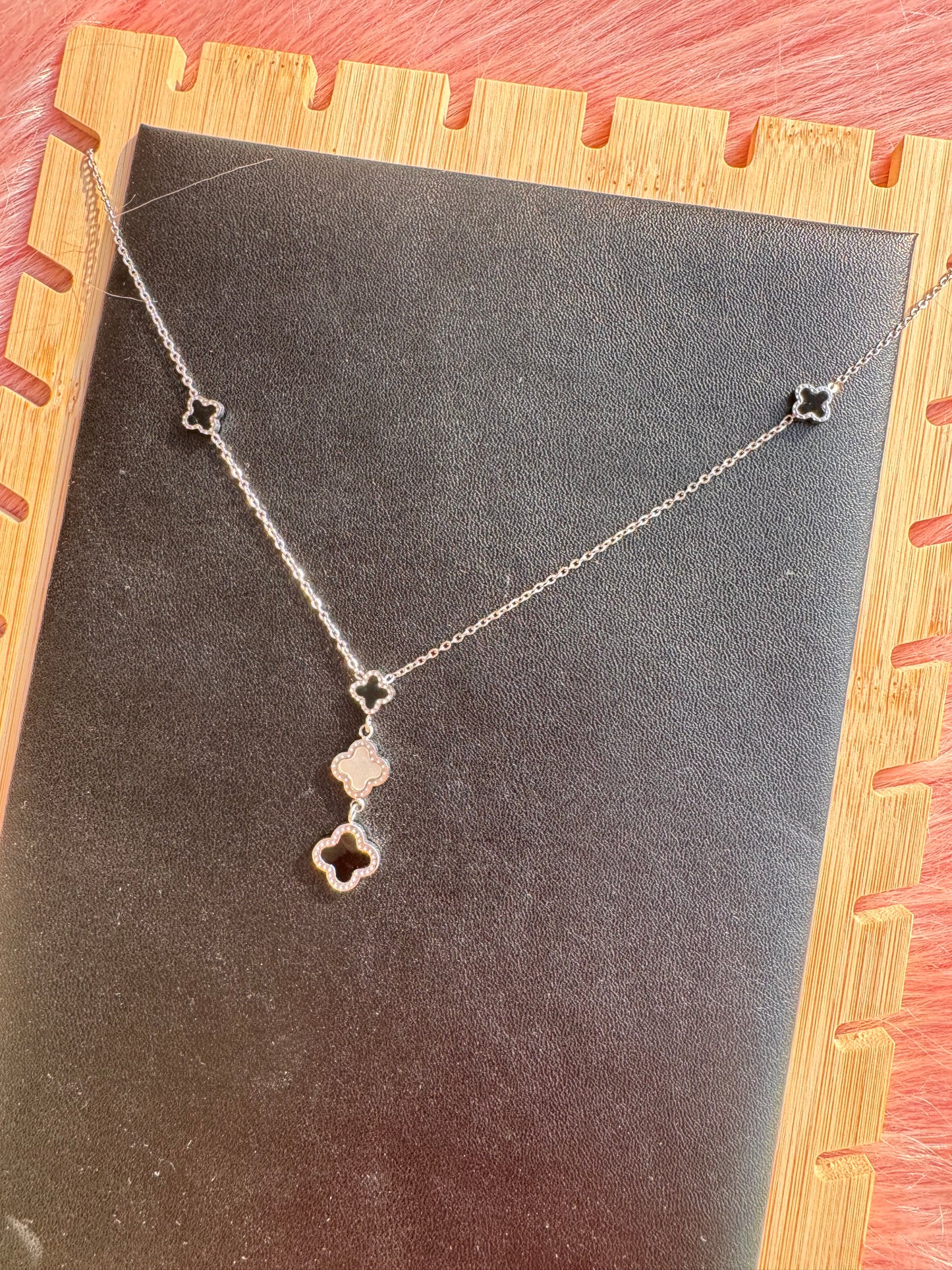 Silver Triple Clover Drop Necklace – Black & White Accents