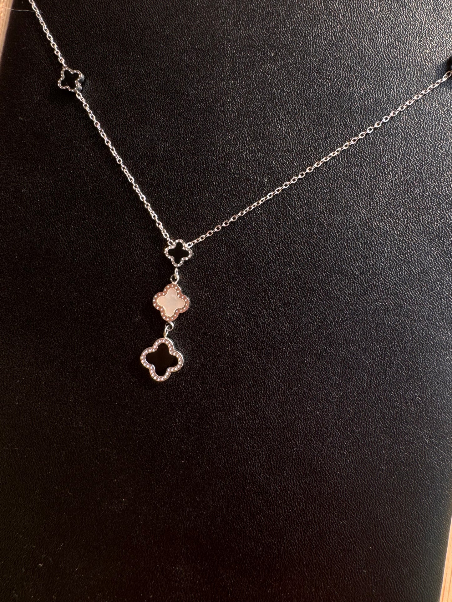 Silver Triple Clover Drop Necklace – Black & White Accents