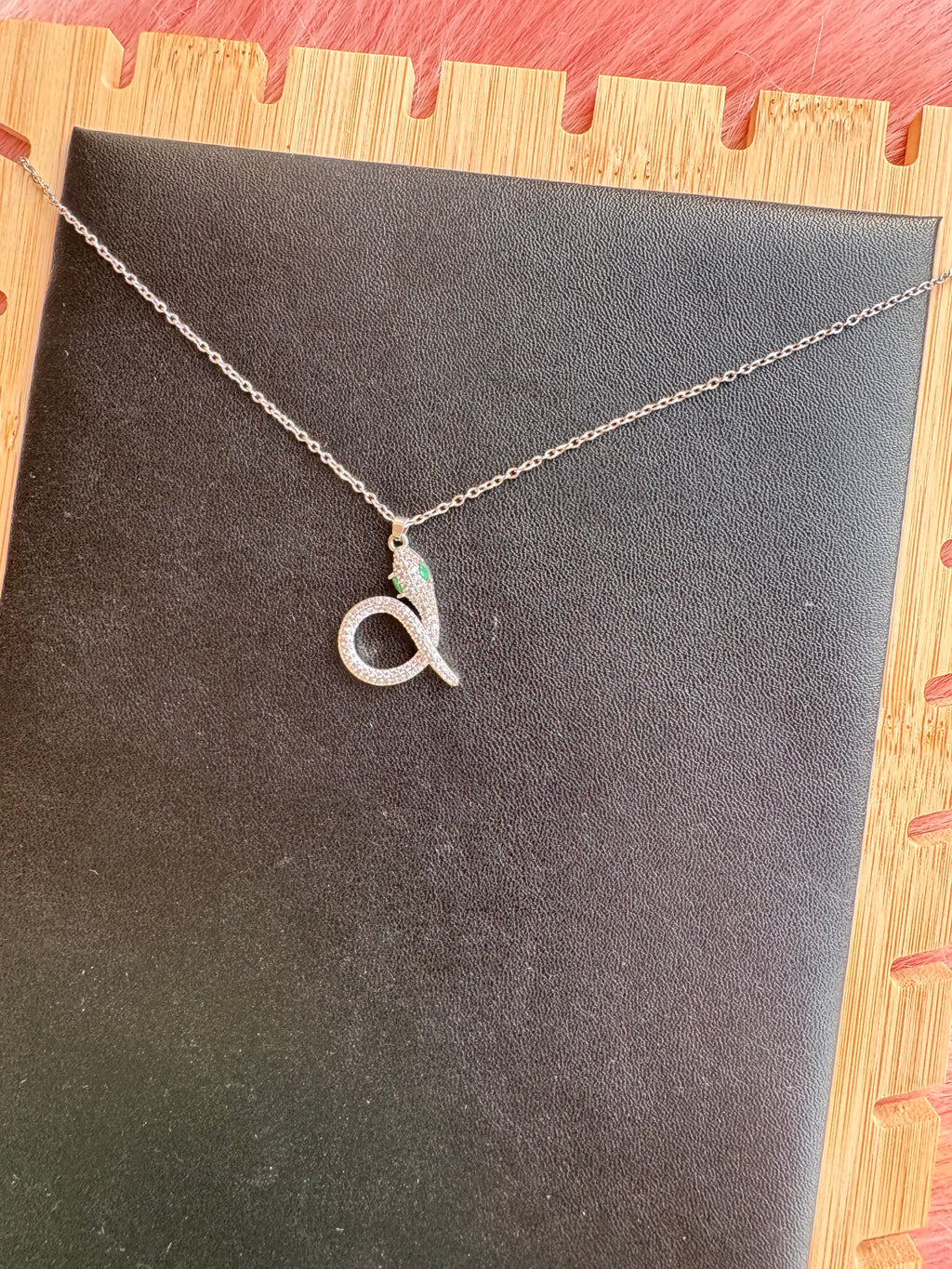 Emerald-Eyed Pavé Snake Pendant Necklace