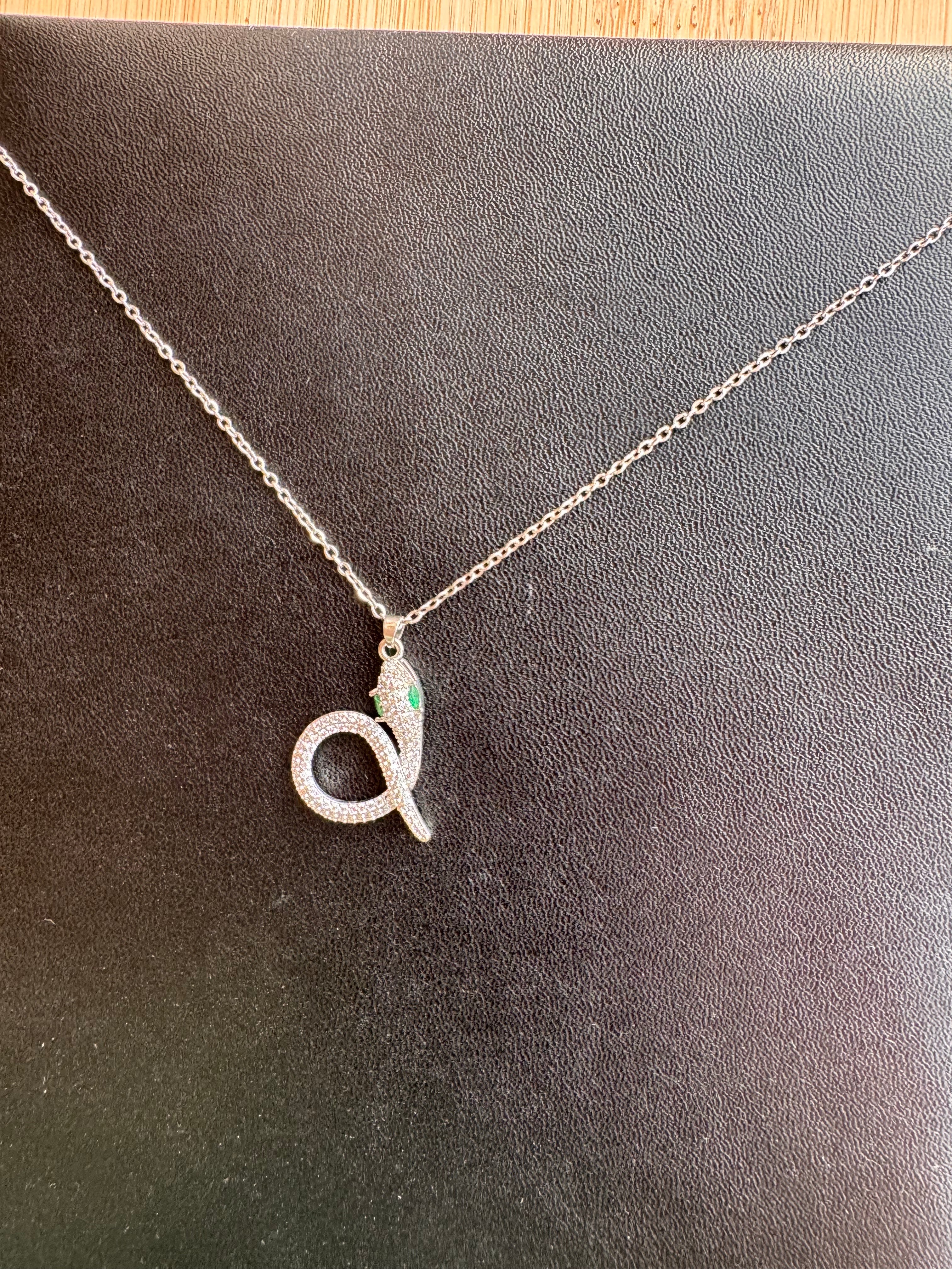 Emerald-Eyed Pavé Snake Pendant Necklace