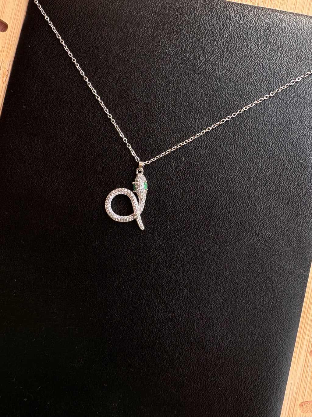 Emerald-Eyed Pavé Snake Pendant Necklace