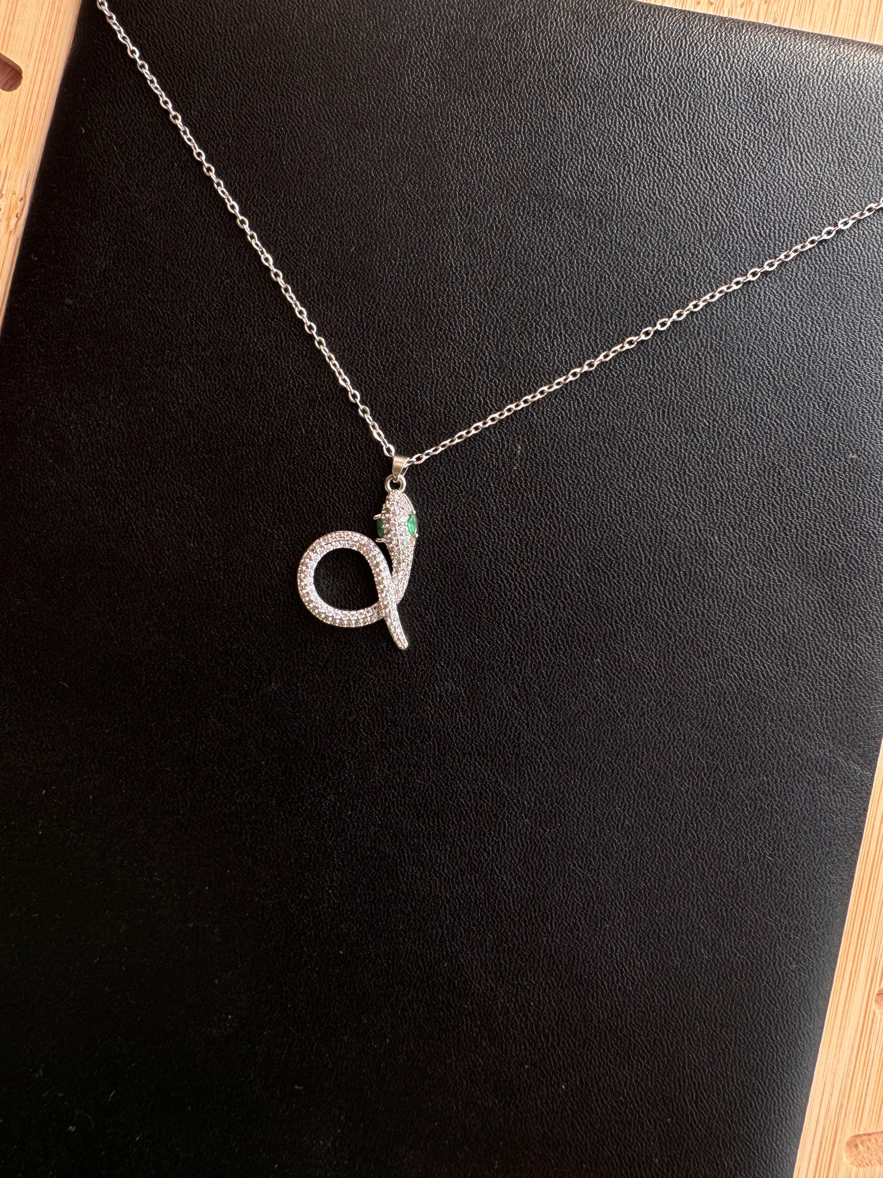 Emerald-Eyed Pavé Snake Pendant Necklace