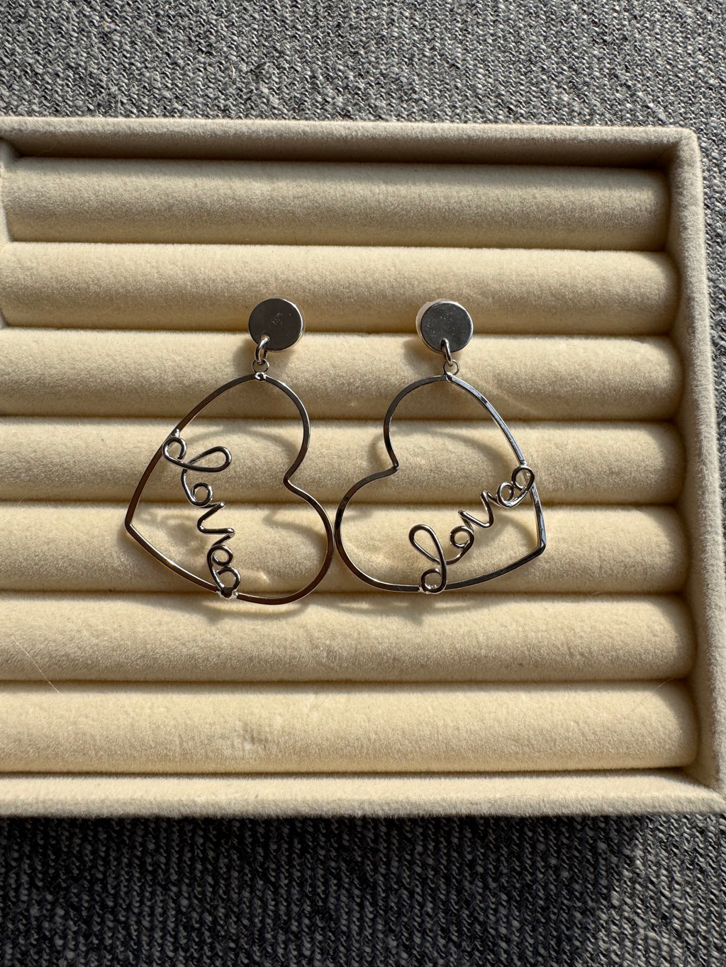 The Silver "Love" Heart Statement Drop Earrings