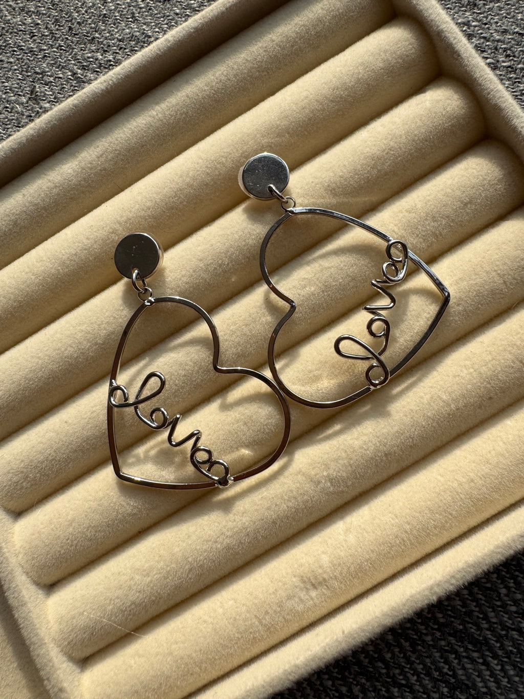 The Silver "Love" Heart Statement Drop Earrings