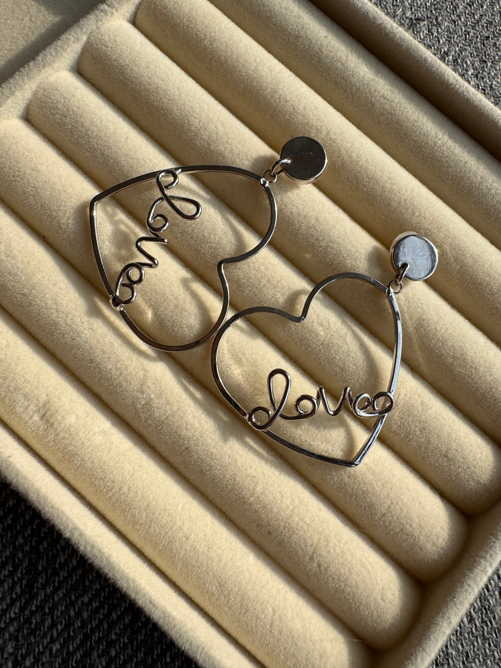 The Silver "Love" Heart Statement Drop Earrings