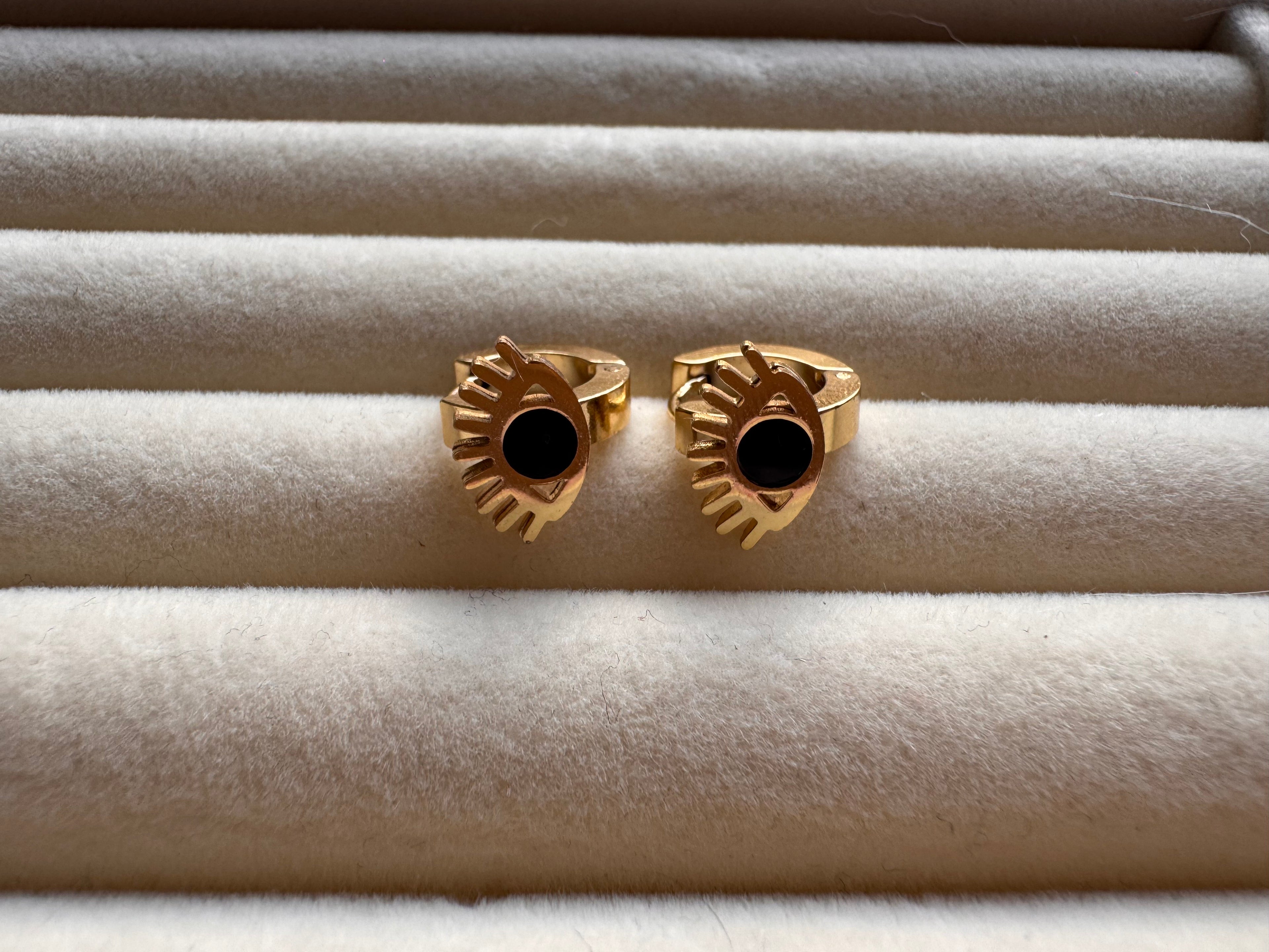 The Onyx Eye & Lash Gold Huggie Hoops