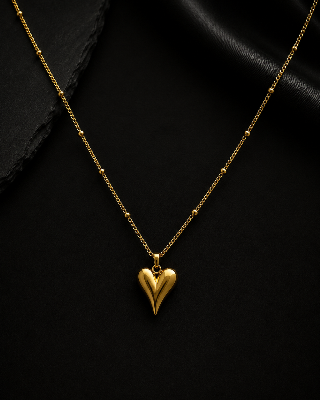 The Elongated Gold Heart Satellite Necklace