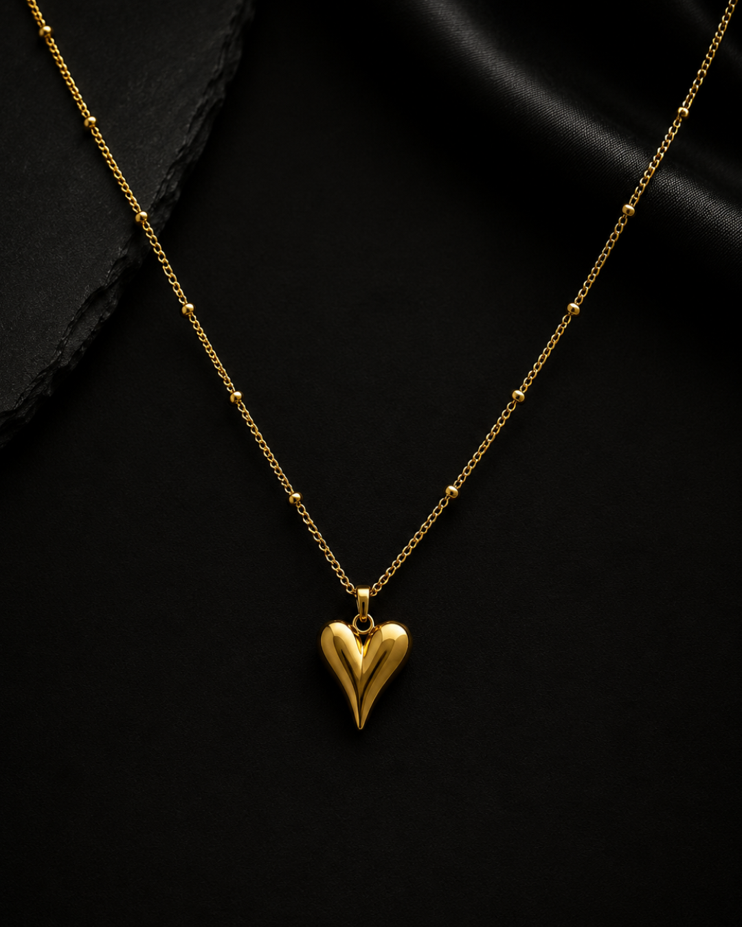 The Elongated Gold Heart Satellite Necklace