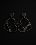 The Silver "Love" Heart Statement Drop Earrings